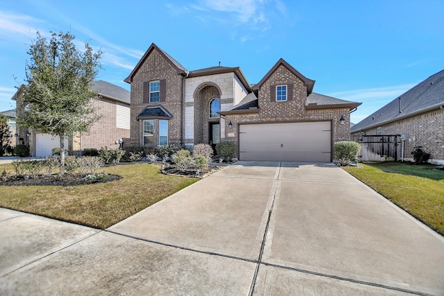 view of front of property with brick siding, a shingled roof, concrete driveway, an attached garage, and a front lawn