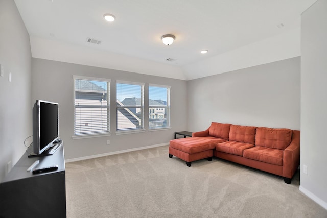 living area featuring lofted ceiling, recessed lighting, light colored carpet, visible vents, and baseboards