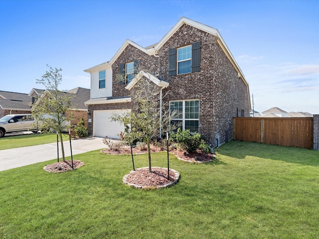 traditional-style house featuring a front yard, concrete driveway, brick siding, and fence