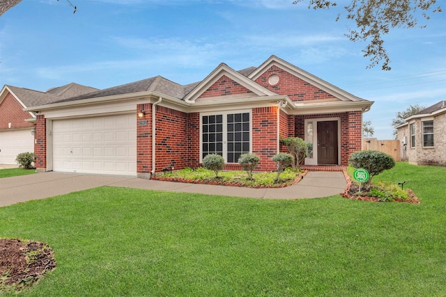 view of front of house featuring a garage, driveway, a front lawn, and brick siding