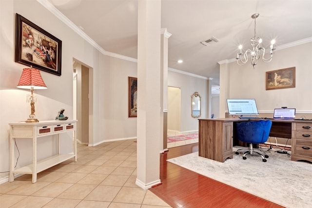 home office featuring a chandelier, visible vents, baseboards, ornamental molding, and light wood-type flooring