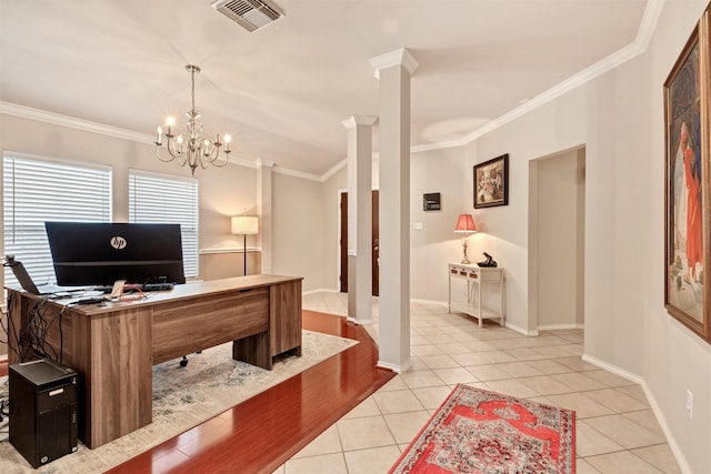 office space with decorative columns, a notable chandelier, light tile patterned floors, visible vents, and ornamental molding