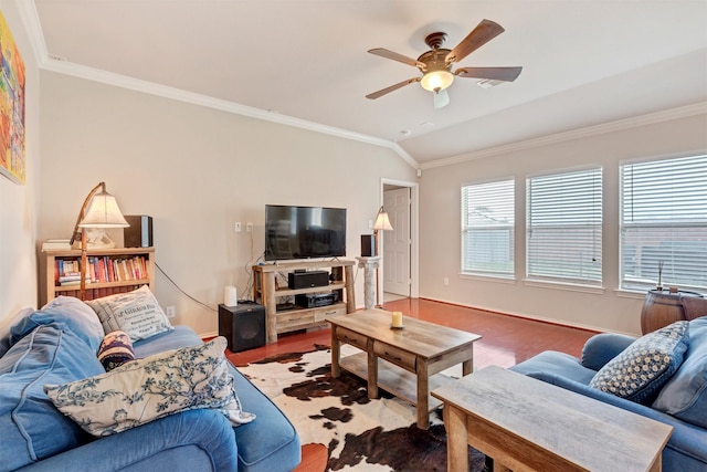 living room with lofted ceiling, ornamental molding, a ceiling fan, and wood finished floors