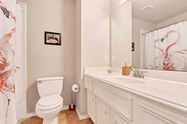 full bath with tile patterned flooring, toilet, vanity, visible vents, and baseboards