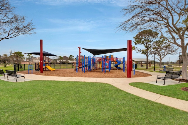 community play area with a lawn