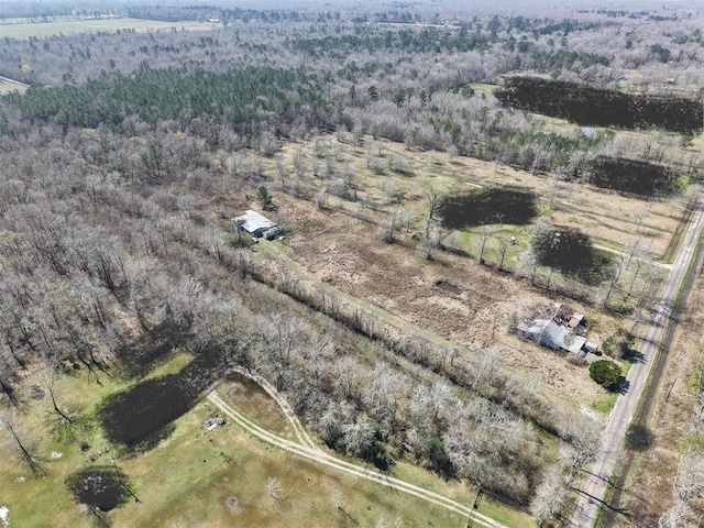 aerial view featuring a rural view and a forest view