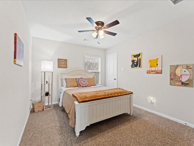 carpeted bedroom with ceiling fan, visible vents, and baseboards