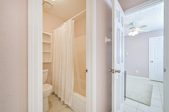 bathroom with a textured ceiling, ceiling fan, toilet, shower / tub combo, and tile patterned floors