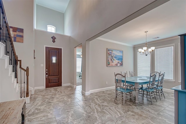 dining space with baseboards, visible vents, ornamental molding, stairs, and a notable chandelier