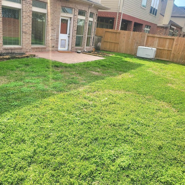 view of yard featuring a patio area and fence