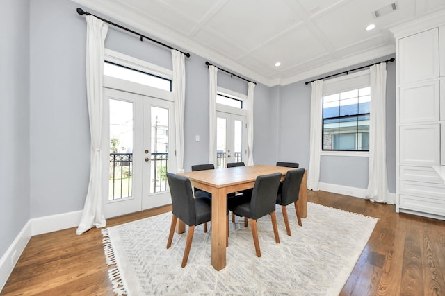 dining room with baseboards, visible vents, coffered ceiling, dark wood-style floors, and french doors