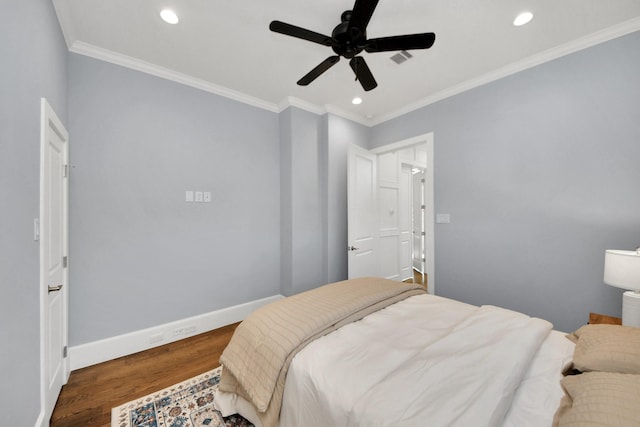 bedroom featuring baseboards, ceiling fan, wood finished floors, crown molding, and recessed lighting