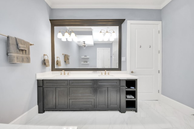 bathroom with baseboards, ornamental molding, and a sink