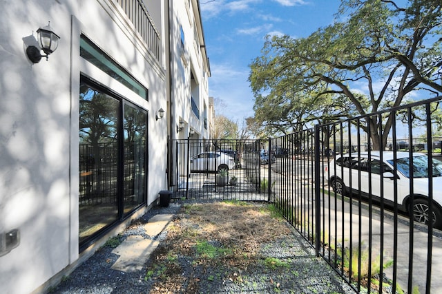 view of gate featuring fence