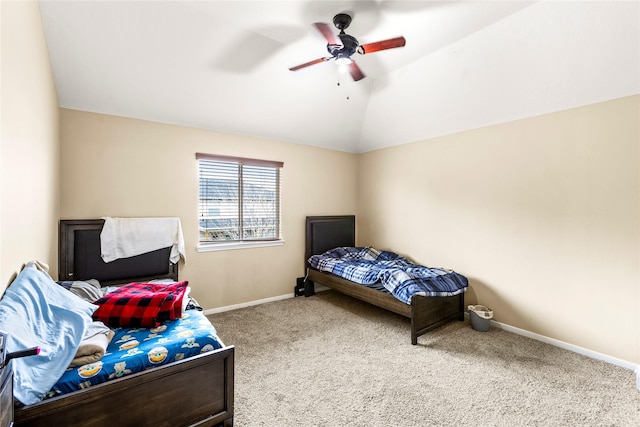 bedroom featuring vaulted ceiling, ceiling fan, carpet flooring, and baseboards