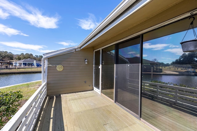 10 April Point Dr S Unit 10, Conroe, TX 77356 - wooden deck featuring a water view