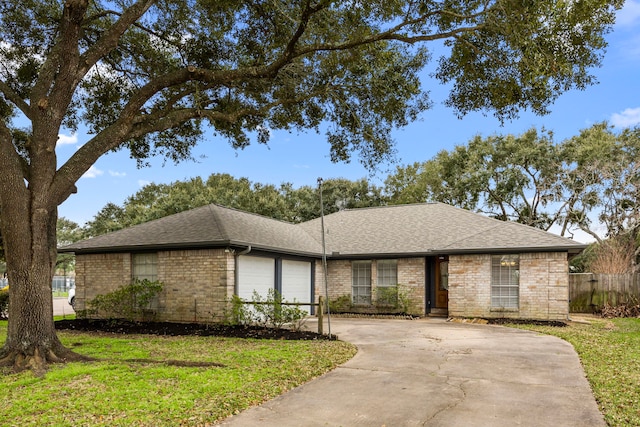 814 Pickford Dr, Katy, TX 77450 - single story home featuring a garage, driveway, and a shingled roof