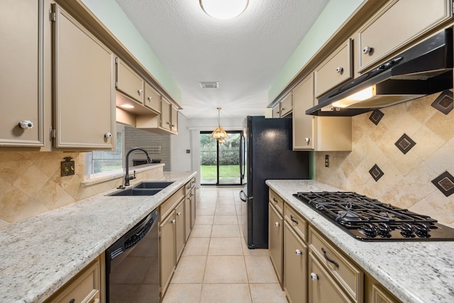 814 Pickford Dr, Katy, TX 77450 - kitchen featuring black appliances, under cabinet range hood, pendant lighting, decorative backsplash, and a textured ceiling