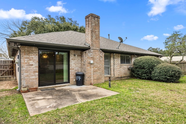814 Pickford Dr, Katy, TX 77450 - back of house with a shingled roof, a chimney, a patio, and brick siding