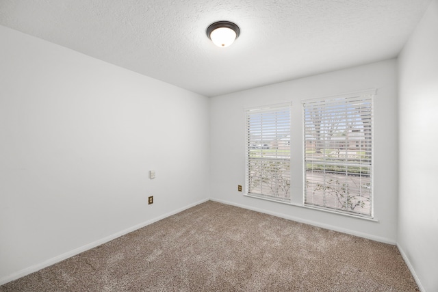 814 Pickford Dr, Katy, TX 77450 - carpeted spare room featuring baseboards and a textured ceiling