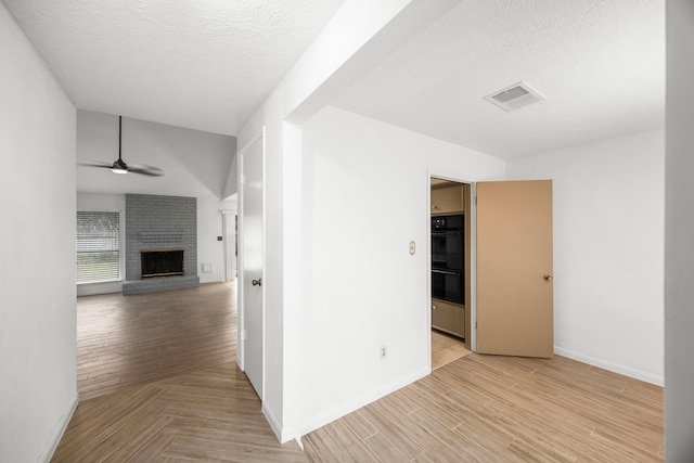 814 Pickford Dr, Katy, TX 77450 - hallway with light wood finished floors and a textured ceiling