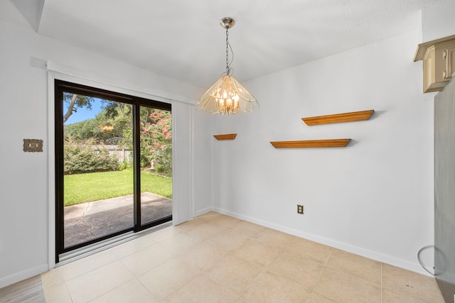 814 Pickford Dr, Katy, TX 77450 - unfurnished dining area with a chandelier and light tile patterned floors