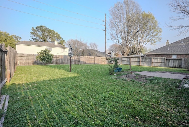 view of yard featuring a fenced backyard