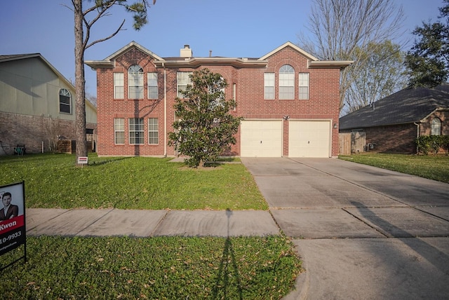 view of front facade with driveway, a front yard, an attached garage, brick siding, and a chimney