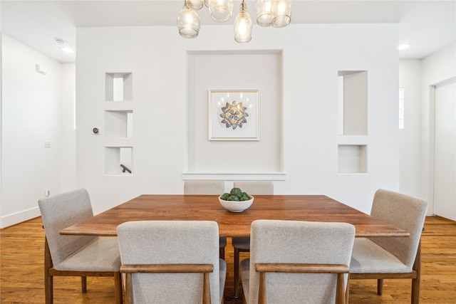 dining room with wood finished floors