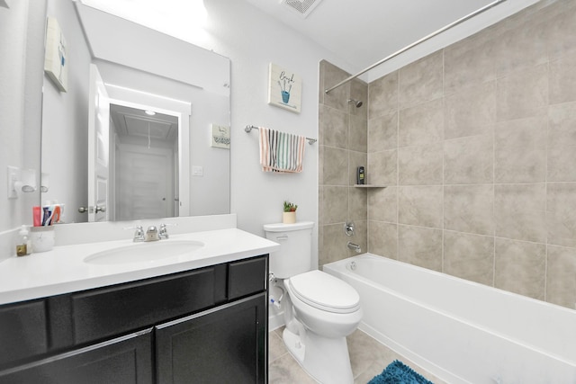 bathroom featuring toilet, visible vents, vanity, shower / bathing tub combination, and tile patterned floors