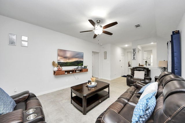 living room featuring visible vents, ceiling fan, and baseboards