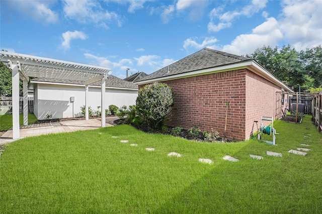 view of yard featuring fence, a patio, and a pergola