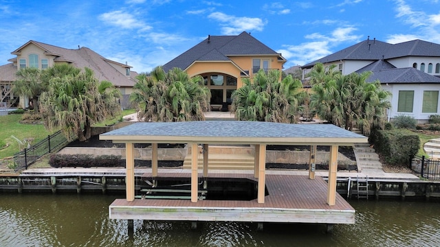2256 Lake Cove Way, Seabrook, TX 77586 - dock featuring a water view, boat lift, and fence