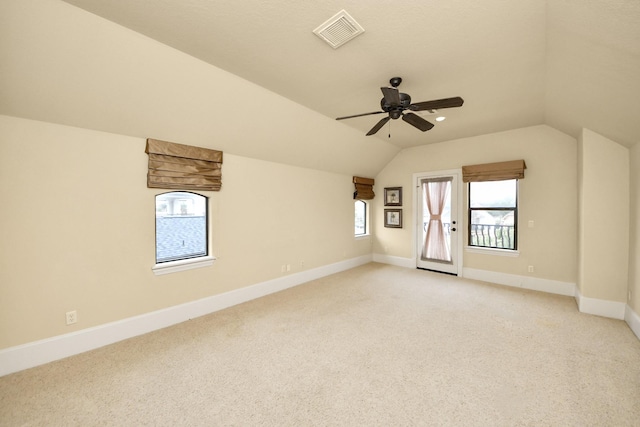 2256 Lake Cove Way, Seabrook, TX 77586 - bonus room with light colored carpet, lofted ceiling, and baseboards
