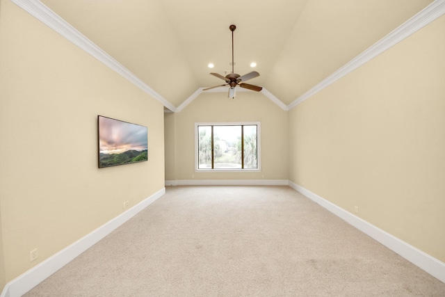 empty room featuring light carpet, ornamental molding, lofted ceiling, and baseboards