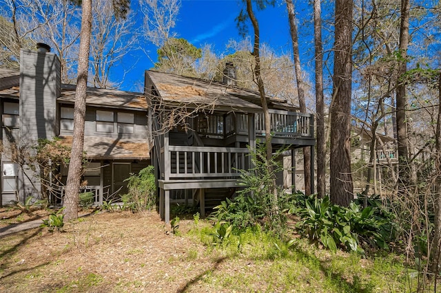 rear view of house with a deck