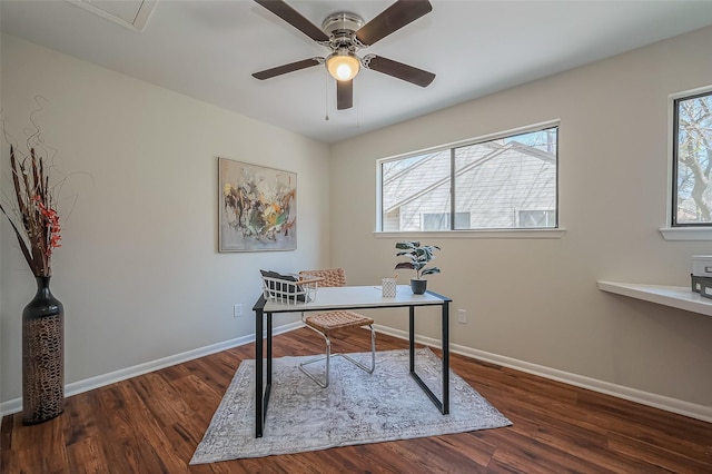 home office featuring a ceiling fan, baseboards, and wood finished floors