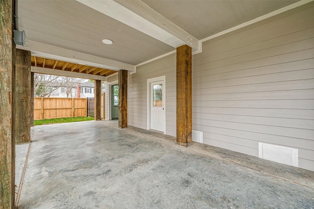 view of patio featuring fence