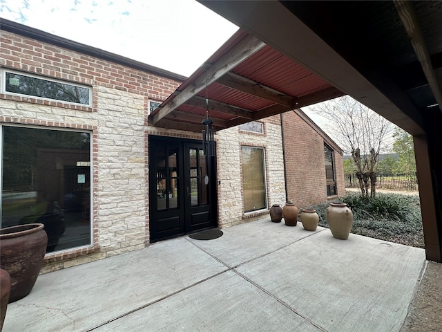 view of patio / terrace featuring french doors