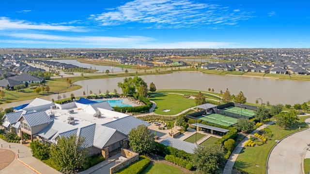 drone / aerial view with a residential view and a water view