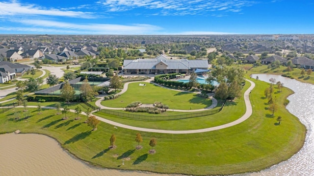 birds eye view of property with a residential view and a water view