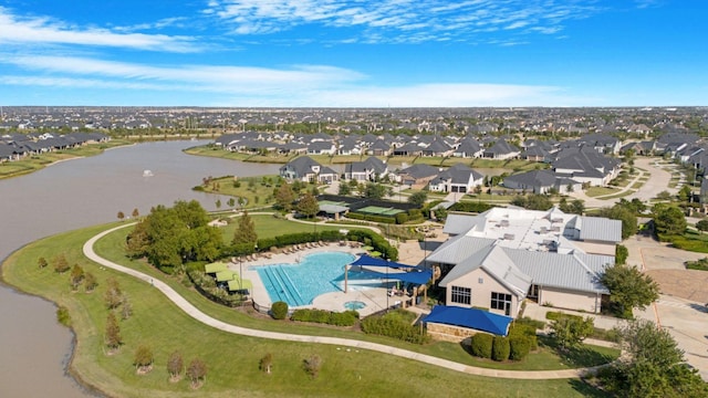 aerial view featuring a water view and a residential view