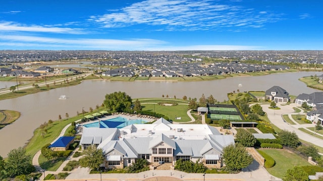 birds eye view of property featuring a water view and a residential view