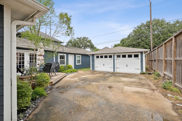 detached garage with fence