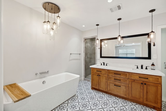 bathroom featuring double vanity, a soaking tub, visible vents, a sink, and a shower stall