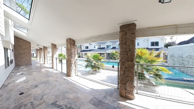 doorway to outside with lofted ceiling