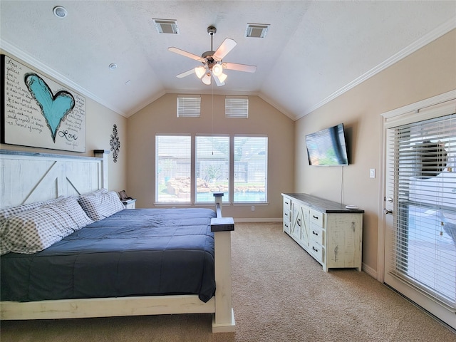 bedroom featuring lofted ceiling, baseboards, visible vents, and light colored carpet