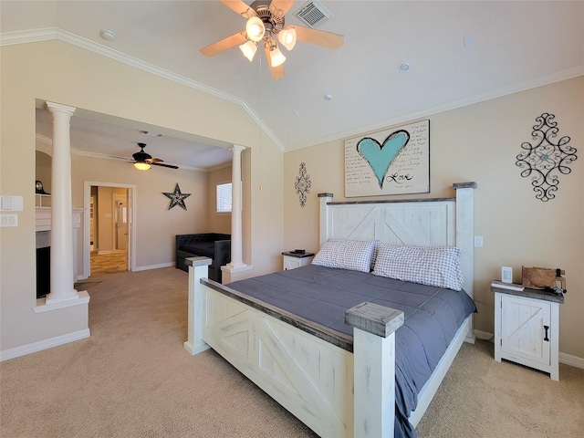 bedroom with light carpet, decorative columns, visible vents, and lofted ceiling