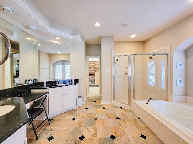 full bath with visible vents, a garden tub, vanity, a shower stall, and recessed lighting