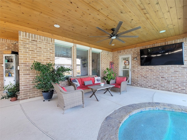 exterior space with an outdoor pool, ceiling fan, and an outdoor hangout area